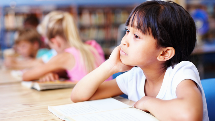 Photograph of student looking bored