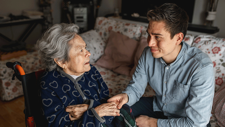 Man sitting with older woman