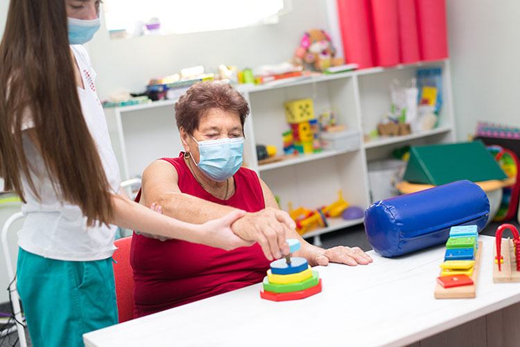 Older woman in physical therapy