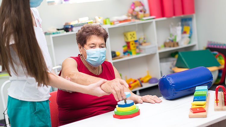 Older woman in physical therapy