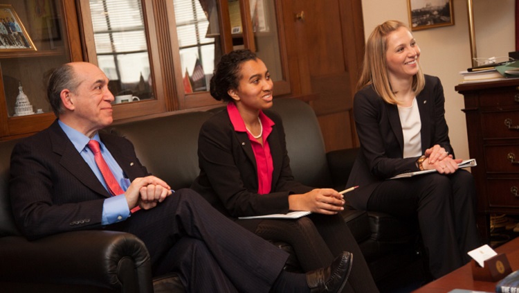 Neuroscientists meet with their congressional representative to discuss science policy and the importance of NIH and NSF funding.