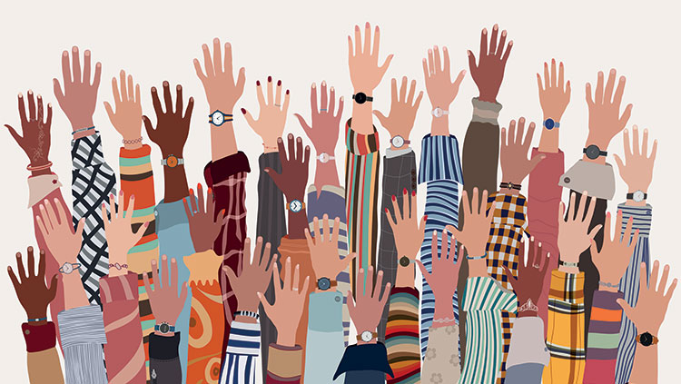 Diverse hands raised in the air