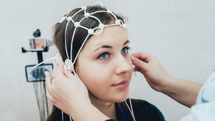 young woman getting an eeg