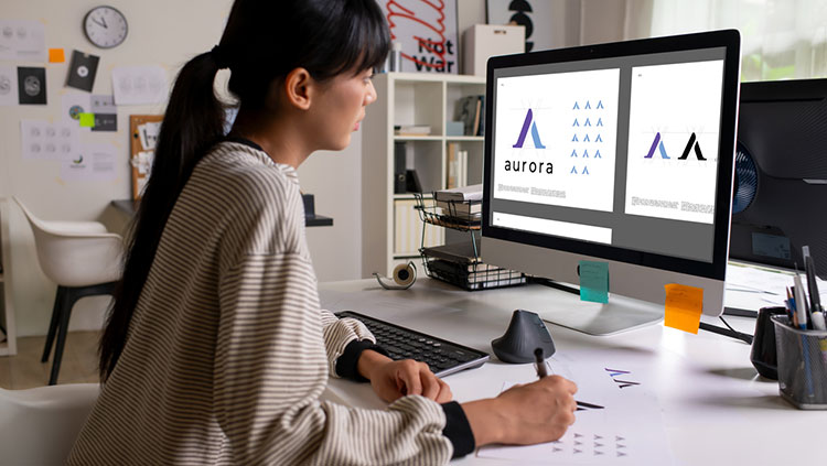 Woman sitting at computer desk