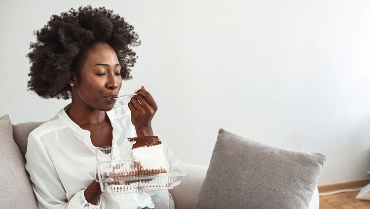 Woman enjoying cake