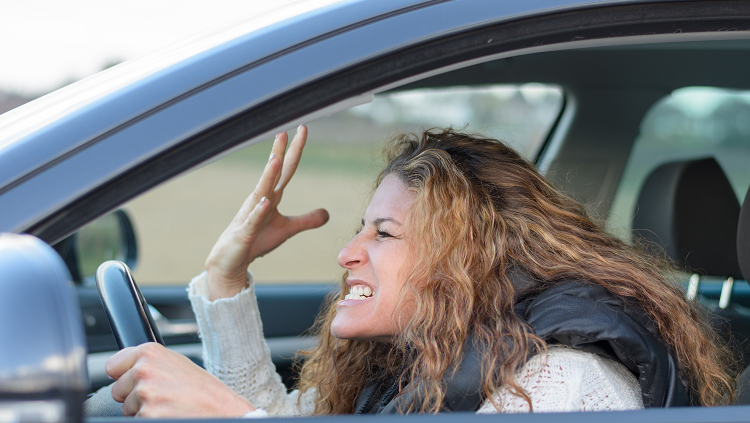 Woman cursing in traffic