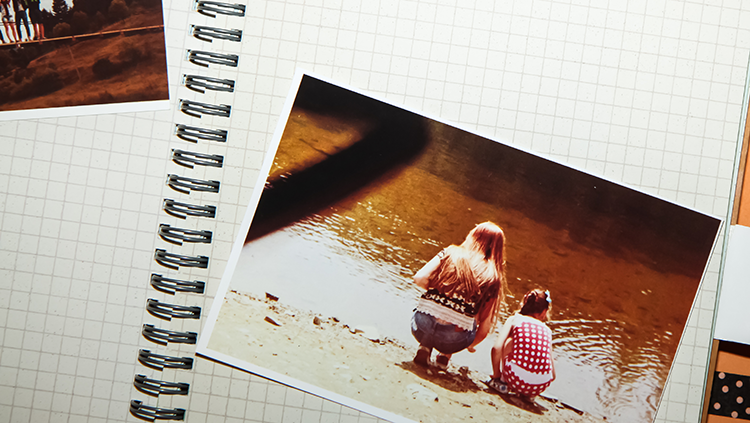 Image of a photo album with photos of memories