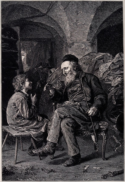 Older man talking to young boy