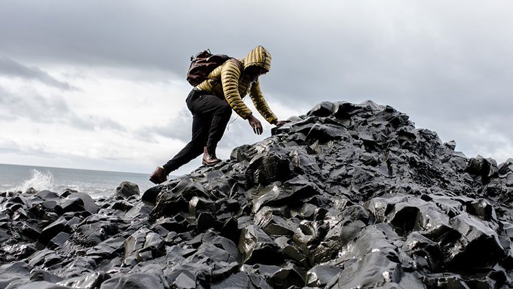 Man climbing mountain