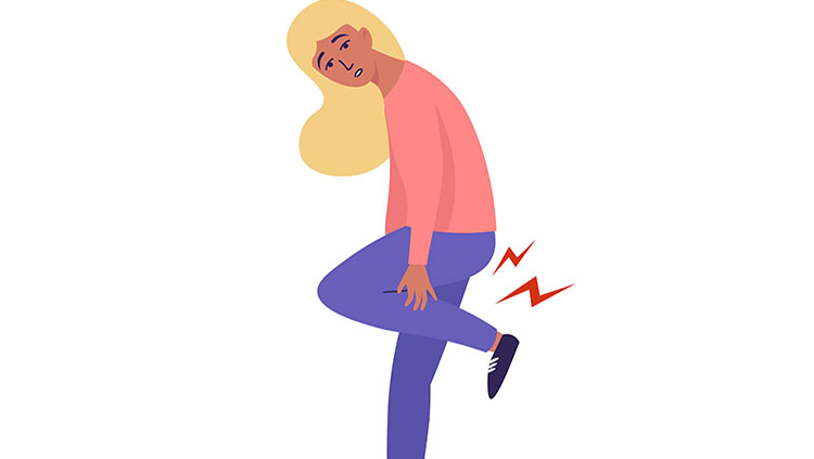 Woman with muscle cramp