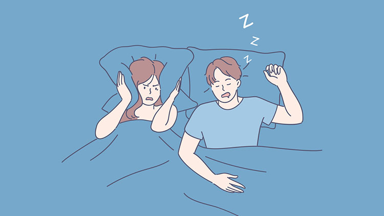 Man snoring next to woman in bed