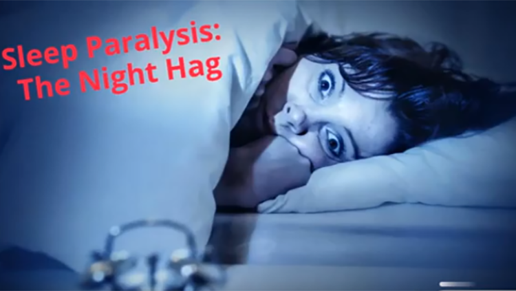 woman in bed afraid