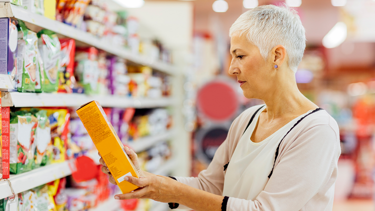 Image of woman choosing groceries