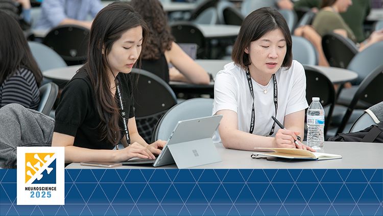 SfN members taking notes